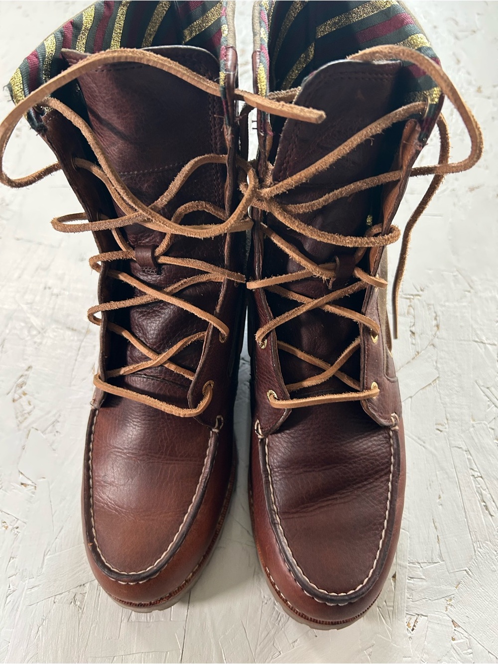 Sperry Women's Brown Lace-Up Leather Boots on with khaki green sides